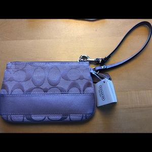 Brand new with tags coach Purple wristlet
